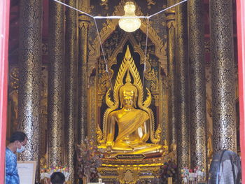 Statue of buddha in building