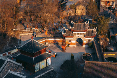 High angle view of illuminated buildings in city