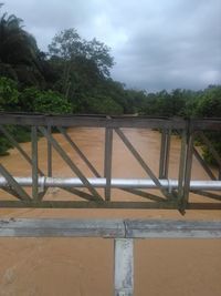 View of bridge over sea against sky