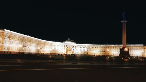 Facade of illuminated building at night