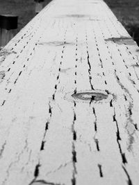 Close-up of tire on snow