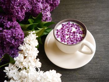 Close-up of pink roses on table