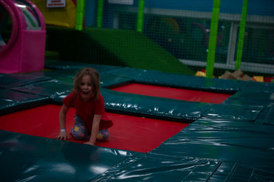 Children play a variety of games in fun room