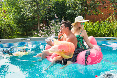 High angle view of people in swimming pool