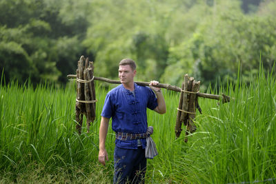 Young man working in farm