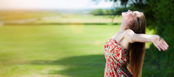 Woman standing on field