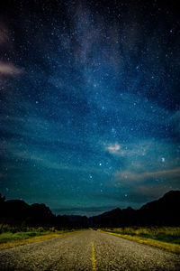 Scenic view of star field against sky at night