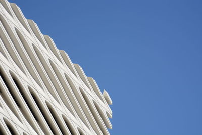 Low angle view of building against blue sky