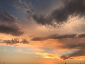 Low angle view of dramatic sky during sunset