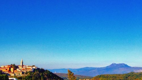 Mountain range against clear blue sky