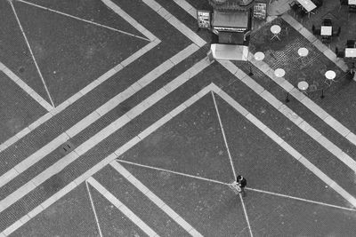 High angle view of road sign on street