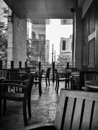 Empty chairs and tables in cafe