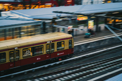 Train at railroad station in city