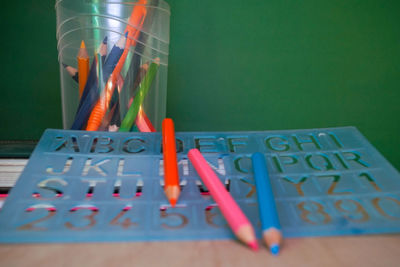 Close-up of school supplies on table