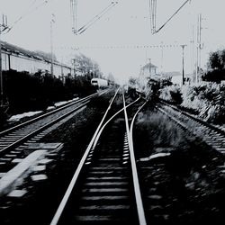 Railroad tracks against sky