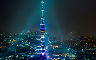 Illuminated buildings in city at night