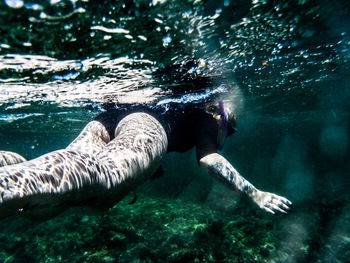 Girl swimming in water