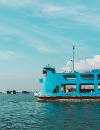 Ship in sea against sky