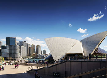 Modern buildings in city against sky