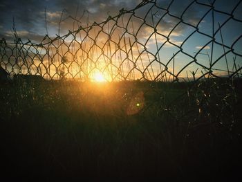 Scenic view of landscape at sunset