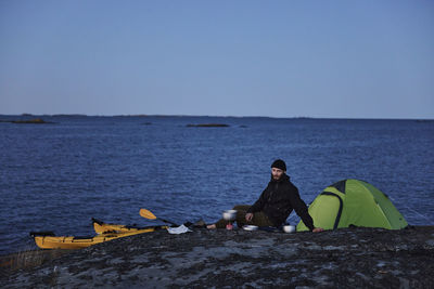 View of tourist camping at sea