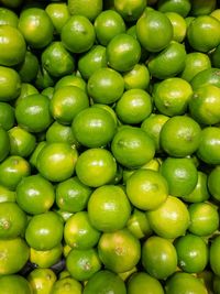 Full frame shot of green tomatoes in market