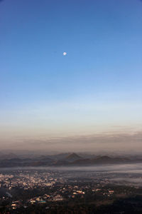 Scenic view of landscape against sky at night