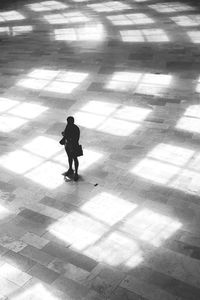 Shadow of woman on wall