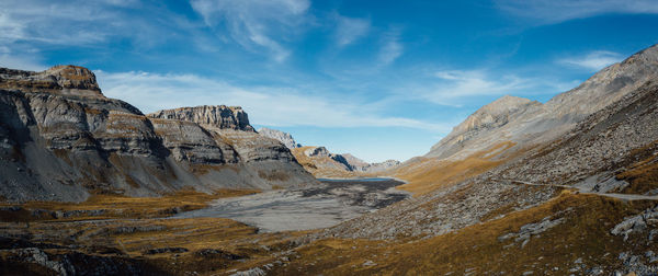 Panoramic view of rocks in mountains against sky