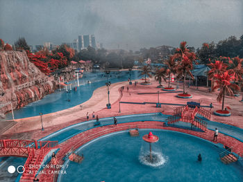 High angle view of swimming pool in city