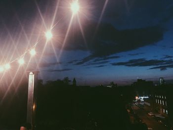 Illuminated street light at night