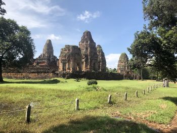 Panoramic view of temple on landscape against sky