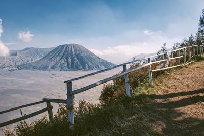 Scenic view of mountain against cloudy sky
