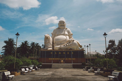 Buddha statue against sky