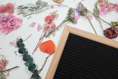 High angle view of various flowers on table