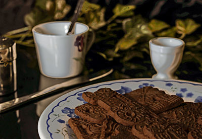 Close-up of coffee cup on table