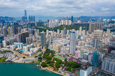 Aerial view of city buildings against sky