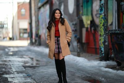 Full length of woman standing in city