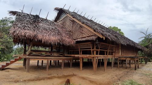 Built structure on beach against sky