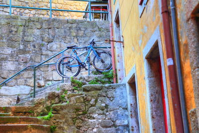 Bicycle parked outside building