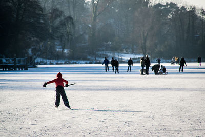 Full length of boy playing in park