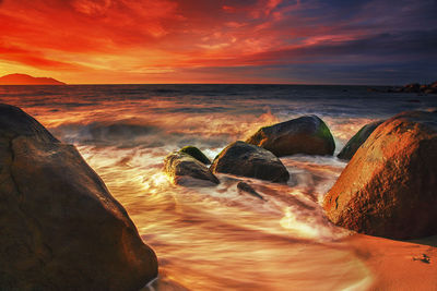 Scenic view of sea against sky during sunset