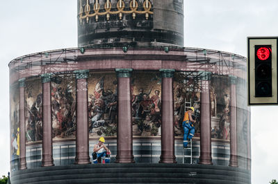 Reflection of building on glass window