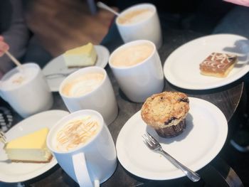 High angle view of coffee served on table