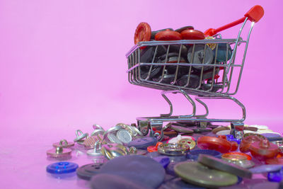 Close-up of food on table against colored background