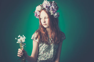 Portrait of girl with flowers