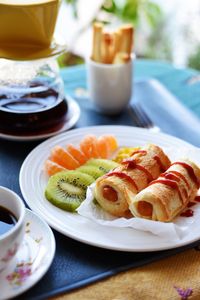 Close-up of breakfast served on table