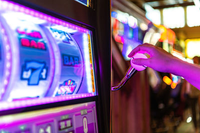 Gambling theme. one handed bandit slot machine bid and spin in las vegas casino. 