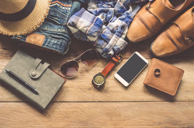 High angle view of fashion accessories on table