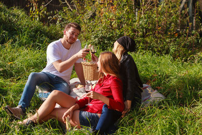 Friends enjoying picnic at park